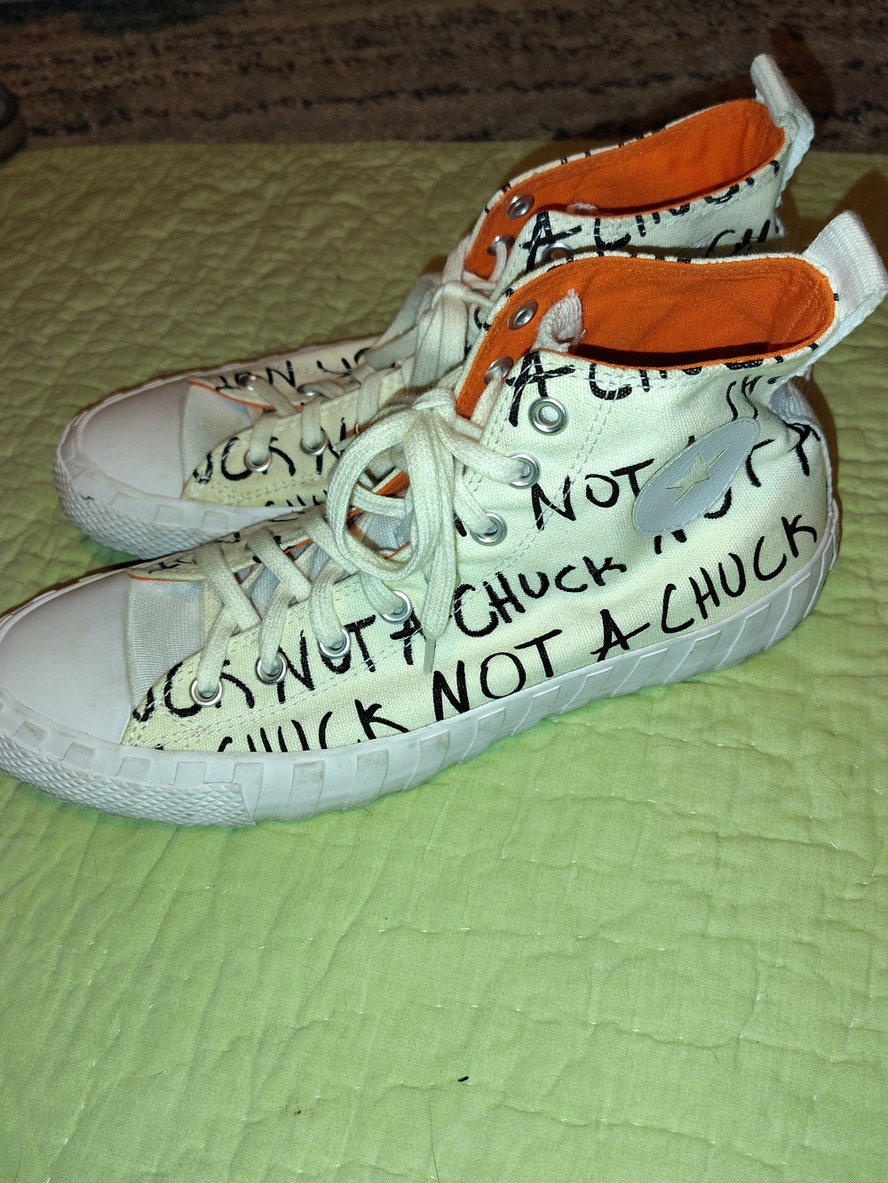 Converse White High-Top Sneakers with Black Script and Orange Interior